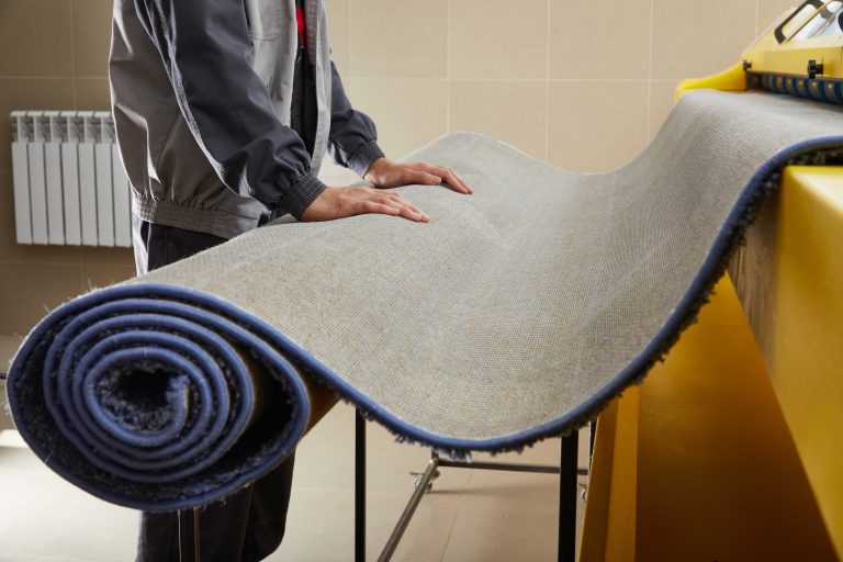 male-worker-cleaning-carpet-automatic-washing-machine-equipment-dryer-laundry-room-(1)