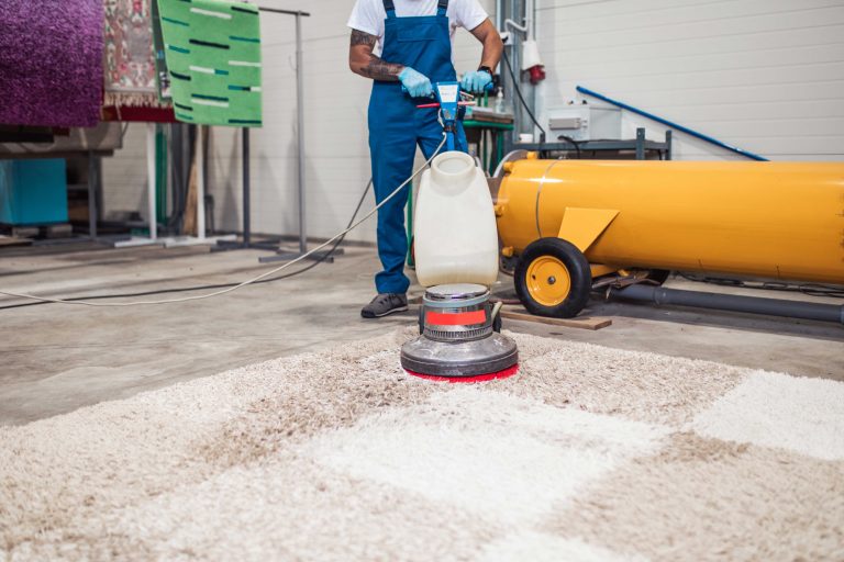 professional-worker-doing-his-job-carpet-washing-service-(1)